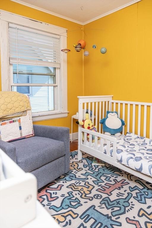 bedroom featuring ornamental molding
