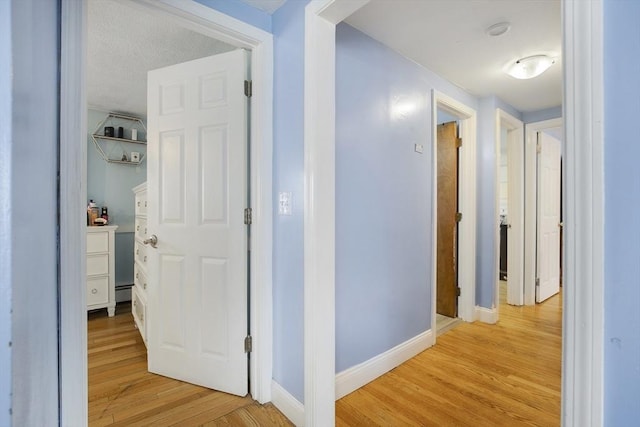 298 Oakland Rd, Barnstable, MA 02601 - hall featuring light wood finished floors and baseboards