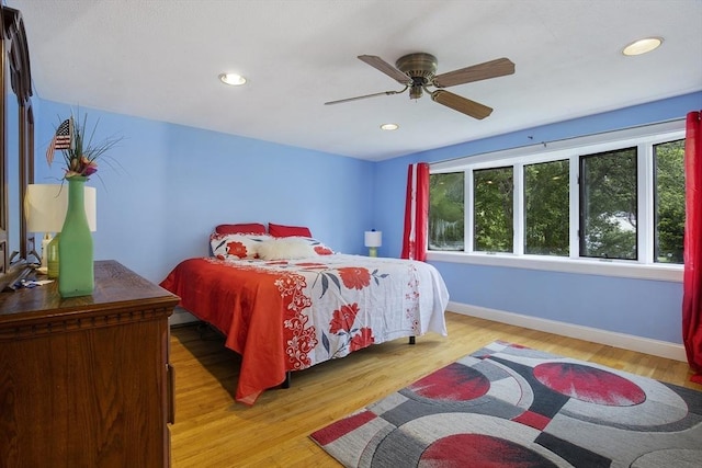 298 Oakland Rd, Barnstable, MA 02601 - bedroom featuring multiple windows, wood finished floors, baseboards, recessed lighting, and ceiling fan
