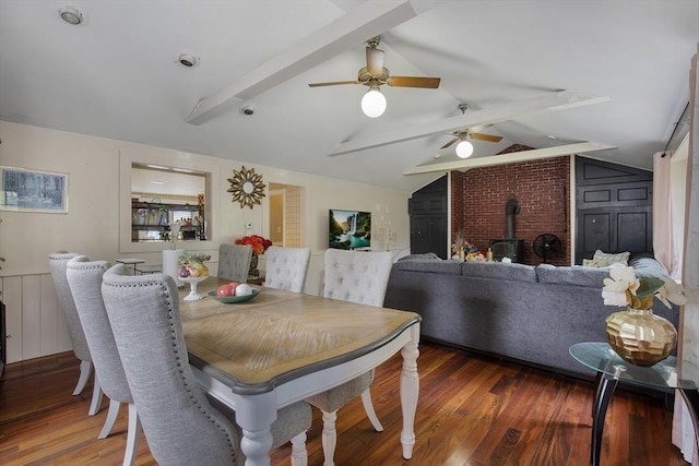 298 Oakland Rd, Barnstable, MA 02601 - dining space with a wood stove, ceiling fan, and wood finished floors