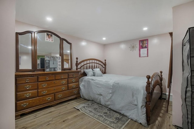 298 Oakland Rd, Barnstable, MA 02601 - bedroom with light wood-style floors, recessed lighting, and baseboard heating