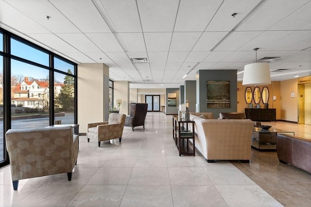 60 Longwood Ave Unit 802, Brookline, MA 02446 - lobby with a drop ceiling and a wall of windows