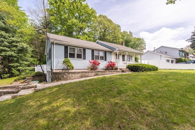 896 Montgomery St, Chicopee, MA 01013 - ranch-style house with a chimney and a porch