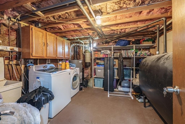 896 Montgomery St, Chicopee, MA 01013 - unfinished below grade area with washer and clothes dryer, oil tank, and a central vacuum unit