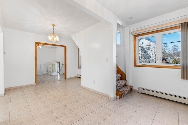 additional living space featuring an inviting chandelier, light tile patterned floors, baseboards, and stairs
