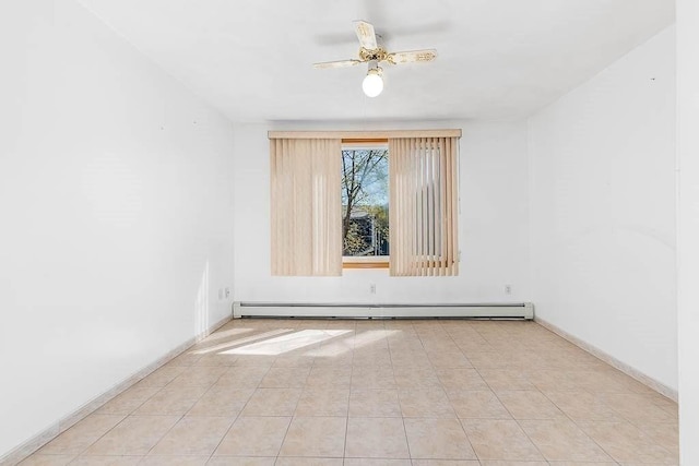 empty room with ceiling fan, a baseboard heating unit, and baseboards