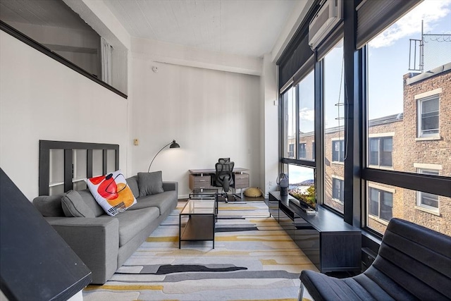 living room featuring a wealth of natural light and light wood-type flooring