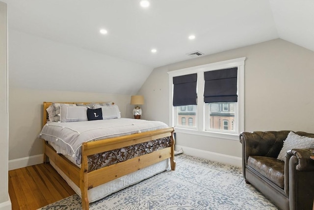782 E 4th St, Boston, MA 02127 - bedroom featuring lofted ceiling, baseboards, recessed lighting, and wood finished floors