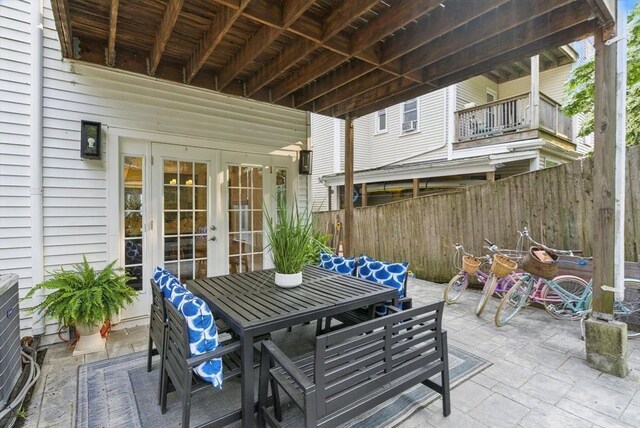 782 E 4th St, Boston, MA 02127 - fenced backyard featuring french doors, outdoor dining area, and a patio