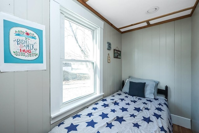 bedroom featuring multiple windows