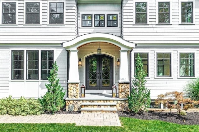 entrance to property featuring french doors