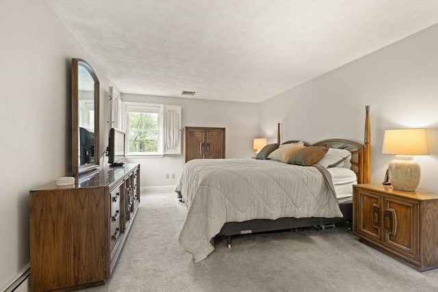 18 Sunset Dr, Sharon, MA 02067 - bedroom with light carpet and a baseboard heating unit