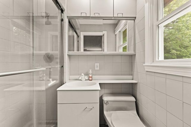 18 Sunset Dr, Sharon, MA 02067 - bathroom featuring tile walls, a stall shower, vanity, and toilet