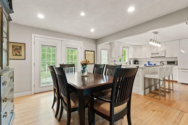 18 Sunset Dr, Sharon, MA 02067 - dining room featuring light wood-style floors, recessed lighting, and baseboards