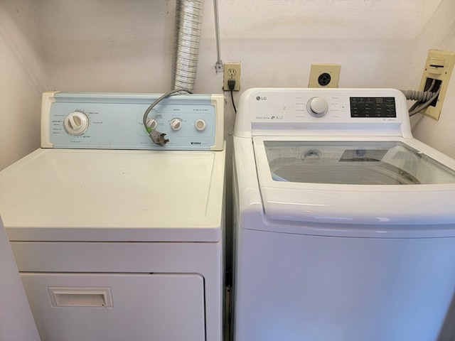 laundry area with washer and dryer