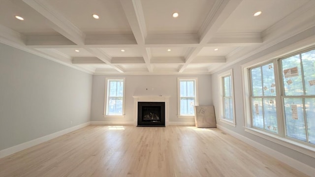 784 Main St, Hudson, MA 01749 - unfurnished living room with beam ceiling, recessed lighting, light wood finished floors, a fireplace with flush hearth, and coffered ceiling