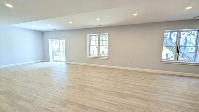 784 Main St, Hudson, MA 01749 - empty room featuring light wood-type flooring and recessed lighting
