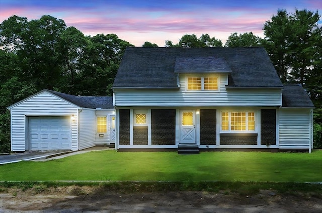 5 Woodland Dr, Oxford, MA 01540 - view of front of home featuring an attached garage, a front yard, driveway, and a shingled roof