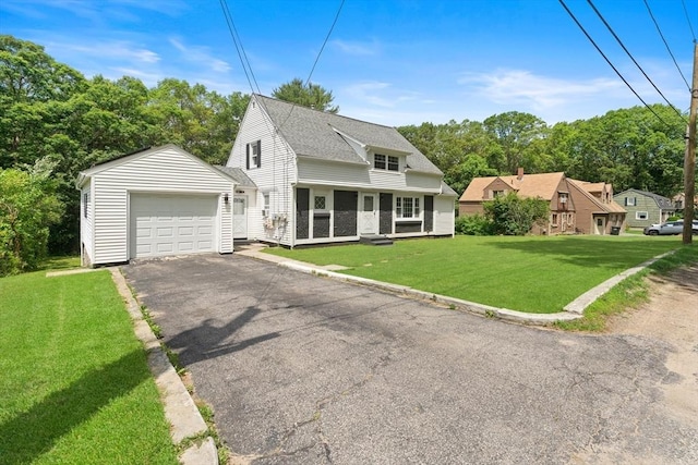 5 Woodland Dr, Oxford, MA 01540 - view of front of property with a front yard, driveway, a shingled roof, and a garage