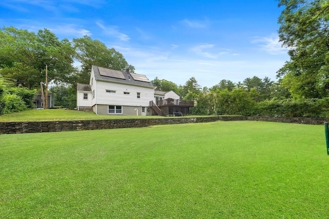 5 Woodland Dr, Oxford, MA 01540 - view of green lawn featuring a wooden deck and stairs