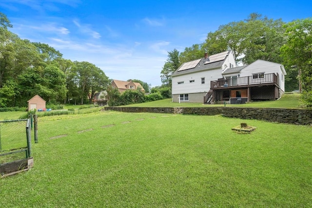 5 Woodland Dr, Oxford, MA 01540 - view of yard featuring stairway, a wooden deck, and a storage shed