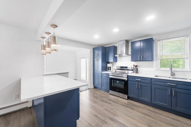 5 Woodland Dr, Oxford, MA 01540 - kitchen featuring stainless steel range with electric stovetop, wall chimney exhaust hood, blue cabinets, a baseboard heating unit, and light countertops