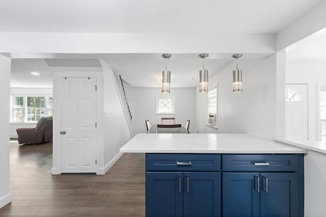5 Woodland Dr, Oxford, MA 01540 - kitchen featuring a peninsula, blue cabinetry, dark wood finished floors, light countertops, and recessed lighting