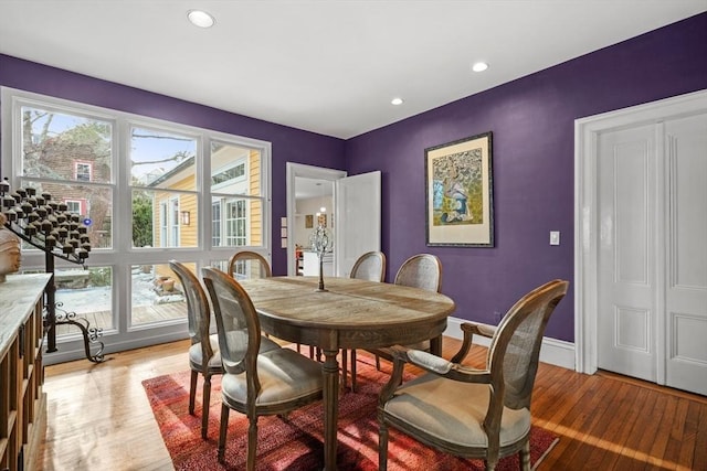 dining area featuring a wealth of natural light and light wood-type flooring