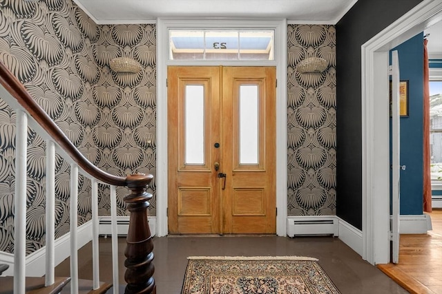 foyer with a baseboard heating unit