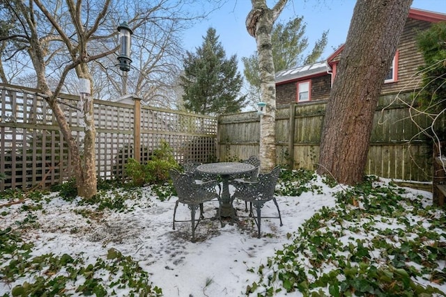 view of snow covered patio