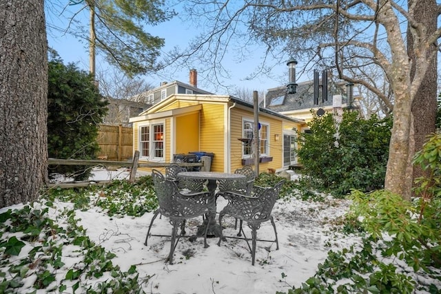 view of snow covered property