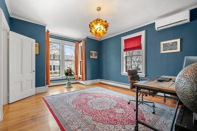 office with a baseboard heating unit, wood-type flooring, ornamental molding, and an AC wall unit