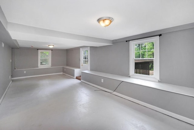 100 Main, Acton, MA 01720 - unfurnished room featuring concrete floors and baseboards