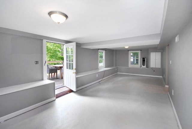 100 Main, Acton, MA 01720 - spare room featuring baseboards and concrete flooring