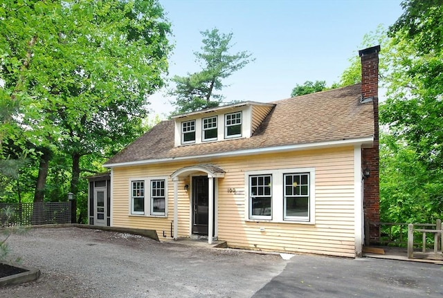 100 Main, Acton, MA 01720 - view of front of property featuring roof with shingles