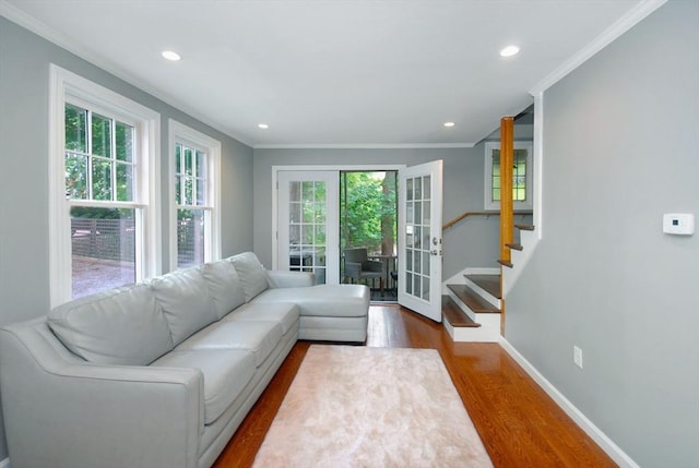 100 Main, Acton, MA 01720 - living area with crown molding, dark wood-style floors, recessed lighting, stairs, and baseboards