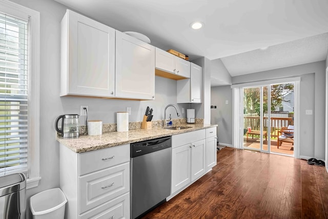 kitchen featuring dishwasher, sink, a healthy amount of sunlight, and white cabinetry