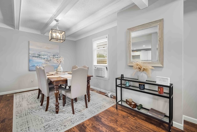 dining area featuring beamed ceiling, a chandelier, a textured ceiling, and hardwood / wood-style flooring