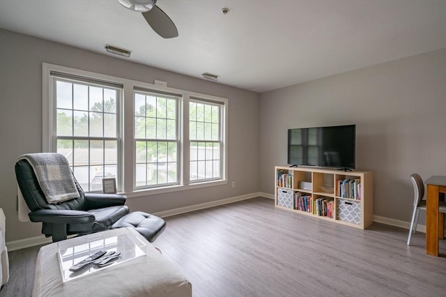 1 Riverview Blvd Unit 2-213, Methuen, MA 01844 - living area featuring baseboards, wood finished floors, and ceiling fan
