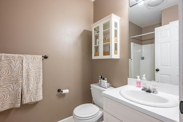 1 Riverview Blvd Unit 2-213, Methuen, MA 01844 - full bathroom with vanity, toilet, a shower, and baseboards