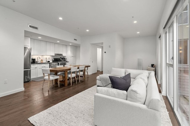 126 Salem Unit 3, Boston, MA 02113 - living area with dark wood-style floors and recessed lighting