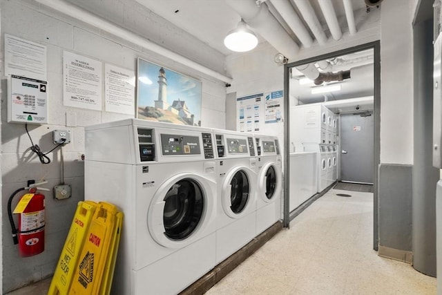 29 Concord Ave Unit 302, Cambridge, MA 02138 - community laundry room with washing machine and dryer, estacked washer and dryer, and light floors