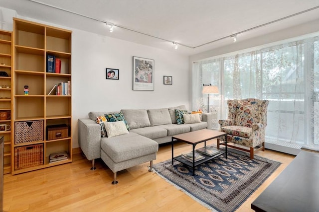 29 Concord Ave Unit 302, Cambridge, MA 02138 - living room with track lighting and wood finished floors