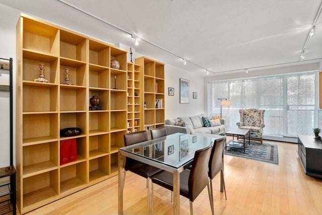 29 Concord Ave Unit 302, Cambridge, MA 02138 - wine room featuring track lighting and light wood-style floors