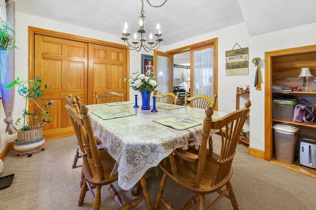 67 Main St, Atkinson, NH 03811 - dining space featuring a chandelier and light carpet