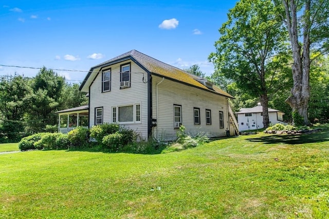 67 Main St, Atkinson, NH 03811 - view of home's exterior featuring a yard