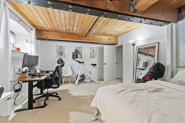 carpeted bedroom with wooden ceiling and beamed ceiling