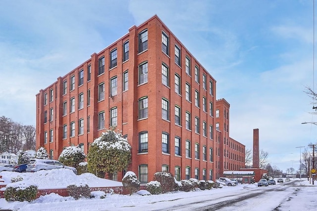 view of snow covered property