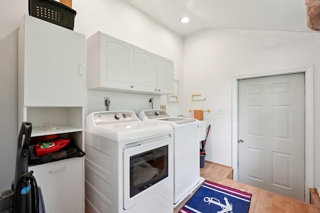156 Langen Rd, Lancaster, MA 01523 - washroom with separate washer and dryer, cabinet space, and wood finished floors