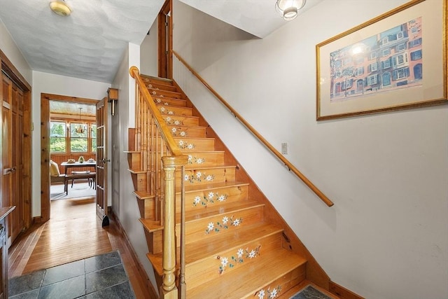 5 Vasa St, Billerica, MA 01862 - stairway featuring tile patterned floors and baseboards